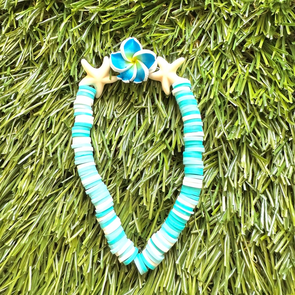 Blue and White Beaded bracelet with Flower Pendant